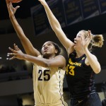 Vanderbilt guard Morgan Batey (25) shoots on Arizona State guard Eliza Normen (43) during the first half in a first-round game in the NCAA women's college basketball tournament, Saturday, March 22, 2014, in Toledo, Ohio. (AP Photo/Rick Osentoski)