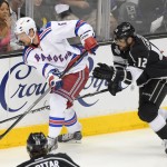  New York Rangers defenseman Anton Stralman, of Sweden,left, skates past Los Angeles Kings right wing Marian Gaborik, of Slovakia, during the first period in Game 1 of the NHL hockey Stanley Cup Finals, Wednesday, June 4, 2014, in Los Angeles. (AP Photo/Mark J. Terrill)