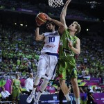Dominican Republic's James Ferldeine, left, vies for the ball against Slovenia's Jaka Blazic, during Basketball World Cup Round of 16 match between Dominican Republic and Slovenia at the Palau Sant Jordi in Barcelona, Spain, Saturday, Sept. 6, 2014. The 2014 Basketball World Cup competition will take place in various cities in Spain from Aug. 30 through to Sept. 14. (AP Photo/Manu Fernandez)