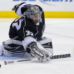 Los Angeles Kings goalie Jonathan Quick makes a save against the San Jose Sharks during the first period in Game 2 of a second-round NHL hockey Stanley Cup playoff series, Thursday, May 16, 2013, in Los Angeles. (AP Photo/Mark J. Terrill)