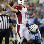 Arizona Cardinals quarterback John Skelton (19) is sacked for a six-yard loss by Tennessee Titans defensive end Kamerion Wimbley (95) in the second quarter of an NFL football preseason game on Thursday, Aug. 23, 2012, in Nashville, Tenn. (AP Photo/Joe Howell)