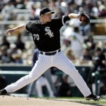 Chicago White Sox starting pitcher Erik Johnson throws against the Los Angeles Dodgers in the first inning of an exhibition spring training baseball game in Glendale, Ariz., Sunday, Feb. 24, 2013. (AP Photo/Paul Sancya)