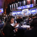 Members of the Chicago Bears organization confer during the third round of the NFL football draft, Friday, April 26, 2013, at Radio City Music Hall in New York. (AP Photo/Jason DeCrow)