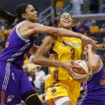 Phoenix Mercury's Candice Dupree, left, fouls Los Angeles Sparks' Candace Parker, center as Mercury's Diana Taurasi, right rear, also defends during the second half in Game 1 of their WNBA basketball Western Conference semifinal series on Thursday, Sept. 19, 2013, in Los Angeles. The Mercury won 86-75. (AP Photo/Danny Moloshok)