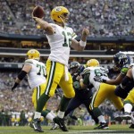 Green Bay Packers quarterback Aaron Rodgers (12) passes against the Seattle Seahawks in the first half of an NFL football game, Monday, Sept. 24, 2012, at CenturyLink Field in Seattle. (AP Photo/Ted S. Warren)