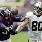 Houston Texans' Danieal Manning (38) breaks up a pass to New Orleans Saints' Jimmy Graham (80) during the first half of a preseason game in Houston. (AP Photo/Eric Gay)