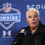 Atlanta Falcons head coach Mike Smith answers a question during a news conference at the NFL football scouting combine in Indianapolis, Friday, Feb. 22, 2013. (AP Photo/Michael Conroy)
