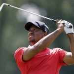 Tiger Woods hits from the fifth fairway during the final round of The Players championship golf tournament at TPC Sawgrass, Sunday, May 12, 2013 in Ponte Vedra Beach, Fla. (AP Photo/John Raoux)