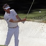 David Lynn, of England, hits out of a bunker on the 10th green during the third round of the Masters golf tournament Saturday, April 13, 2013, in Augusta, Ga. (AP Photo/Charlie Riedel)
