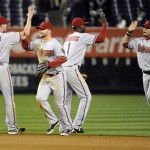 The Arizona Diamondbacks celebrate after defeating the New York Yankees 6-2 in the 12th inning of a baseball game, Thursday, April 18, 2013, at Yankee Stadium in New York. (AP Photo/Bill Kostroun)