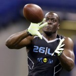 Notre Dame linebacker Prince Shembo makes a catch as he runs a drill at the NFL football scouting combine in Indianapolis, Monday, Feb. 24, 2014. (AP Photo/Michael Conroy)