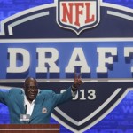 Hall-of-Famer Larry Little announces an NFL football draft pick during the second round on Friday, April 26, 2013, at Radio City Music Hall in New York. (AP Photo/Mary Altaffer)