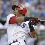 Texas Rangers' Nelson Cruz takes a swing during his at bat in the second inning of a baseball game against the Arizona Diamondbacks Thursday, Aug. 1, 2013, in Arlington, Texas. (AP Photo/LM Otero)