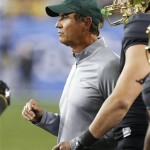 Baylor coach Art Briles talks with his team during the first half of the Fiesta Bowl NCAA college football game against Central Flordia, Wednesday, Jan. 1, 2014, in Glendale, Ariz. (AP Photo/Ross D. Franklin)
