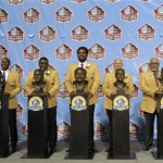 Hall of Fame inductees, from left, Larry Allen, Cris Carter, Dave Robinson, Jonathan Ogden, Bill Parcells, Curley Culp and Warren Sapp pose with their bronze busts during the 2013 Pro Football Hall of Fame Induction Ceremony Saturday, Aug. 3, 2013, in Canton, Ohio. (AP Photo/David Richard)

