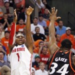 Ohio State forward Deshaun Thomas (1) shoots over Cincinnati forward Yancy Gates (34) in the first half of an East Regional semifinal game in the NCAA men's college basketball tournament, Thursday, March 22, 2012, in Boston. (AP Photo/Michael Dwyer)