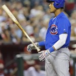 Chicago Cubs' Starlin Castro flips his bat after striking out against the Arizona Diamondbacks during the second inning of a baseball game on Wednesday, July 24, 2013, in Phoenix. (AP Photo/Matt York)