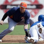 Toronto Blue Jays shortstop Jose Reyes, right, is tagged out on an attempt to steal second base by Houston Astros shortstop Tyler Greene, left, during the first inning of a spring training exhibition baseball game in Dunedin, Fla., on Wednesday, Feb. 27, 2013. (AP Photo/The Canadian Press, Nathan Denette)