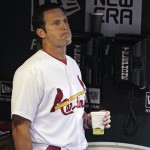 St. Louis Cardinals manager Mike Matheny waits in the dugout for the start of a baseball game against the Arizona Diamondbacks, Thursday, Aug. 16, 2012, in St. Louis. (AP Photo/Tom Gannam)