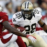 New Orleans Saints running back Mark Ingram (28) turns the corner 
past Arizona Cardinals' Willam Gay (23) during the first quarter of the 
NFL Hall of Fame exhibition football game against the Arizona 
Cardinals, Sunday, Aug. 5, 2012 in Canton, Ohio. (AP Photo/Scott 
Galvin)

