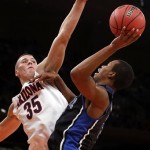  Arizona's Kaleb Tarczewski (35) defends a shot by Duke's Rodney Hood, right, during the second half of an NCAA college basketball game in the championship of the NIT Season Tip-off tournament Friday, Nov. 29, 2013, in New York. Arizona won 72-66. (AP Photo/Jason DeCrow)