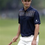 Justin Rose, of England, reacts after a putt on the fifth green during the fourth round of the U.S. Open golf tournament at Merion Golf Club, Sunday, June 16, 2013, in Ardmore, Pa. (AP Photo/Darron Cummings)