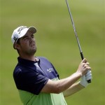 Marc Leishman, of Australia, watches his shot from the first fairway during the final round of The Players championship golf tournament at TPC Sawgrass, Sunday, May 12, 2013, in Ponte Vedra Beach, Fla. (AP Photo/John Raoux)