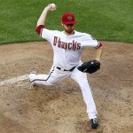 Arizona Diamondbacks pitcher Ian Kennedy delivers to the San Francisco Giants in the second inning of an opening day baseball game, Friday, April 6, 2012, in Phoenix. (AP Photo/Matt York)