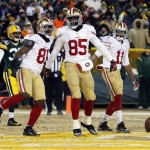  San Francisco 49ers tight end Vernon Davis (85) celebrates a touchdown catch with wide receiver Anquan Boldin (81) during the second half of an NFL wild-card playoff football game, Sunday, Jan. 5, 2014, in Green Bay, Wis. (AP Photo/Jeffrey Phelps)