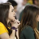 Baylor fans watch during the first half of the Fiesta Bowl NCAA college football game between Baylor and Central Florida on Wednesday, Jan. 1, 2014, in Glendale, Ariz. (AP Photo/Ross D. Franklin)