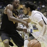 California's Jorge Gutierrez, right, drives the ball against Arizona State 
forward Kyle Cain during the second half of an NCAA college 
basketball game Saturday, Feb. 4, 2012, in Berkeley, Calif. (AP 
Photo/Ben Margot)