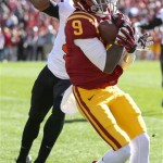  Iowa State wide receiver Quenton Bundrage catches a touchdown in front of Oklahoma State cornerback Justin Gilbert during the first half of an NCAA college football game in Ames, Iowa, Saturday, Oct. 26, 2013.(AP Photo by Justin Hayworth)
