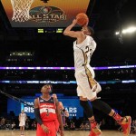 Team Webber's Anthony Davis of the New Orleans Pelicans heads to the basket as Team Hill's Bradley Beal of the Washington Capitals look son during the Rising Star NBA All Star Challenge Basketball game,, Friday, Feb. 14, 2014, in New Orleans. (AP Photo/Bob Donnan, Pool)