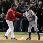 Boston Red Sox manager John Farrell, left, shakes hands with Detroit Tigers manager Jim Leyland, right, before Game 1 of the American League baseball championship series Saturday, Oct. 12, 2013, in Boston. (AP Photo/Charlie Riedel)
