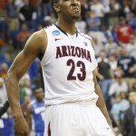 Arizona forward Derrick Williams reacts after blocking a shot by Memphis' Wesley Witherspoon in the final seconds of play at a West Regional NCAA tournament second-round college basketball game, Friday, March 18, 2011, in Tulsa, Okla. Arizona won 77-75. (AP Photo)