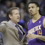  Phoenix Suns coach Jeff Hornacek, left, talks to Suns' Gerald Green (14) during a timeout in the first half of an NBA basketball game in Memphis, Tenn., Tuesday, Dec. 3, 2013. (AP Photo/Danny Johnston)