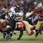 Baltimore Ravens running back Ray Rice (27) rushes away from San Francisco 49ers' Donte Whitner (31), Ray McDonald (91) and NaVorro Bowman (53) during the first half of the NFL Super Bowl XLVII football game, Sunday, Feb. 3, 2013, in New Orleans. (AP Photo/Evan Vucci)