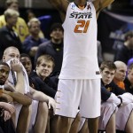 Oklahoma State forward Kamari Murphy (21) watches from the sideline during the second half of a second-round game in the NCAA college basketball tournament against Oregon in San Jose, Calif., Thursday, March 21, 2013. Oregon won 68-55. (AP Photo/Jeff Chiu)