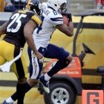 San Diego Chargers wide receiver Danario Alexander (84) heads for the end zone to score a touchdown past Pittsburgh Steelers free safety Ryan Clark (25) after making a catch in the second quarter of an NFL football game in Pittsburgh, Sunday, Dec. 9, 2012. (AP Photo/Gene J. Puskar)