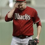 Arizona Diamondbacks pitcher Trevor Cahill reacts after allowing a run-scoring triple to San Francisco Giants' Brandon Belt during the first inning of a baseball game in San Francisco, Monday, May 28, 2012. The Giants won 4-2. (AP Photo/Jeff Chiu)
