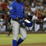 Chicago Cubs' Alfonso Soriano tosses his bat and helmet aside after striking out against the Arizona Diamondbacks in the first inning of a baseball game on Monday, July 22, 2013, in Phoenix. (AP Photo/Ross D. Franklin)
