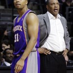 Phoenix Suns guard Sebastian Telfair (31) heads to the bench past head coach Alvin Gentry after being whistled for a technical foul in the third quarter of an NBA basketball game against the Detroit Pistons, Wednesday, Nov. 28, 2012, in Auburn Hills, Mich. The Pistons won 117-77. (AP Photo/Duane Burleson)