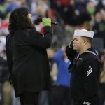  Singer Ann Wilson sings the National Anthem before the NFL football NFC Championship game between the Seattle Seahawks and the San Francisco 49ers Sunday, Jan. 19, 2014, in Seattle. (AP Photo/Ted S. Warren)