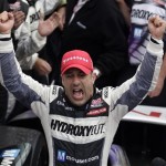 Tony Kanaan, of Brazil, celebrates after winning the Indianapolis 500 auto race at the Indianapolis Motor Speedway in Indianapolis, Sunday, May 26, 2013. (AP Photo/Michael Conroy)