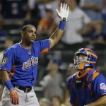 American League's Yoenis Cespedes, of the Oakland Athletics, waves after winning the MLB All-Star baseball Home Run Derby, on Monday, July 15, 2013 in New York. (AP Photo/Kathy Willens)