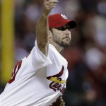 St. Louis Cardinals starter Adam Wainwright pitches against the Pittsburgh Pirates in the first inning of Game 5 of a National League baseball division series, Wednesday, Oct. 9, 2013, in St. Louis. (AP Photo/Charlie Riedel)