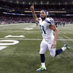 Seattle Seahawks wide receiver Golden Tate (81) celebrates after an NFL football game against the St. Louis Rams, Monday, Oct. 28, 2013, in St. Louis. The Seahawks won 14-9. (AP Photo/Michael Conroy)