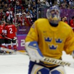 Team Canada celebrates after a goal by forward Sidney Crosby during the second period of the men's gold medal ice hockey game at the 2014 Winter Olympics, Sunday, Feb. 23, 2014, in Sochi, Russia. (AP Photo/Julio Cortez)