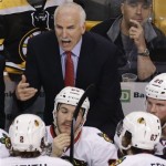 Chicago Blackhawks head coach Joel Quenneville instructs his team during the second period in Game 4 of the NHL hockey Stanley Cup Finals against the Boston Bruins, Wednesday, June 19, 2013, in Boston. (AP Photo/Charles Krupa)