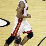 Miami Heat center Chris Bosh (1) reacts to play against the San Antonio Spurs during the first half of Game 6 of the NBA Finals basketball game, Tuesday, June 18, 2013 in Miami. (AP Photo/Wilfredo Lee)